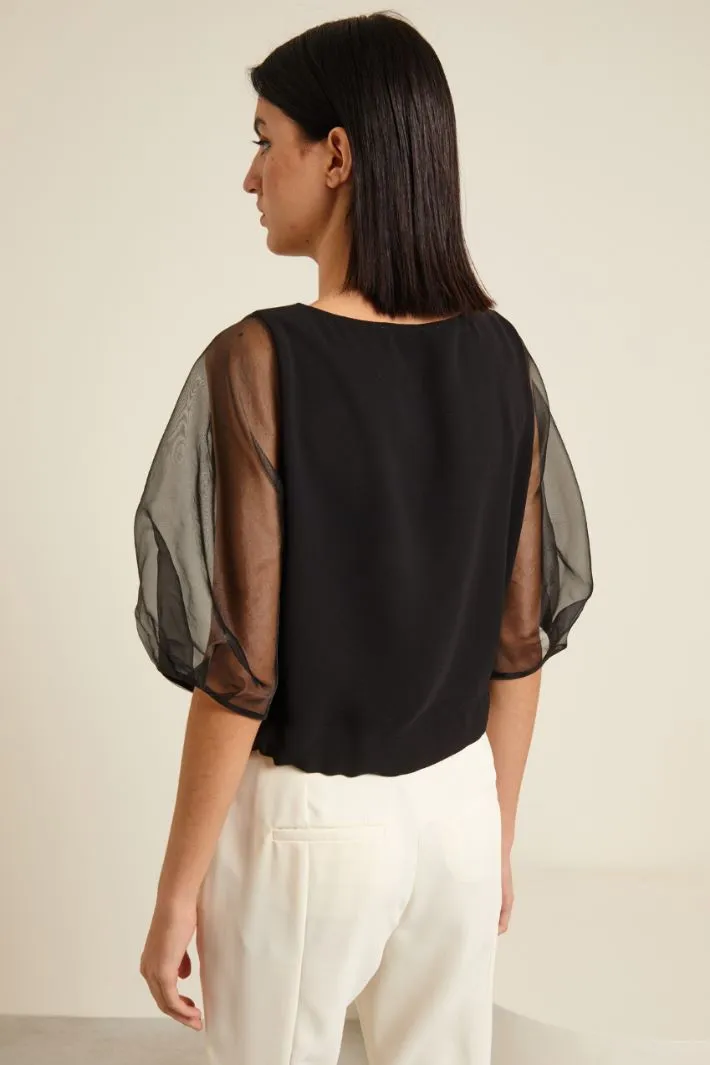 Blusa con maniche a palloncino