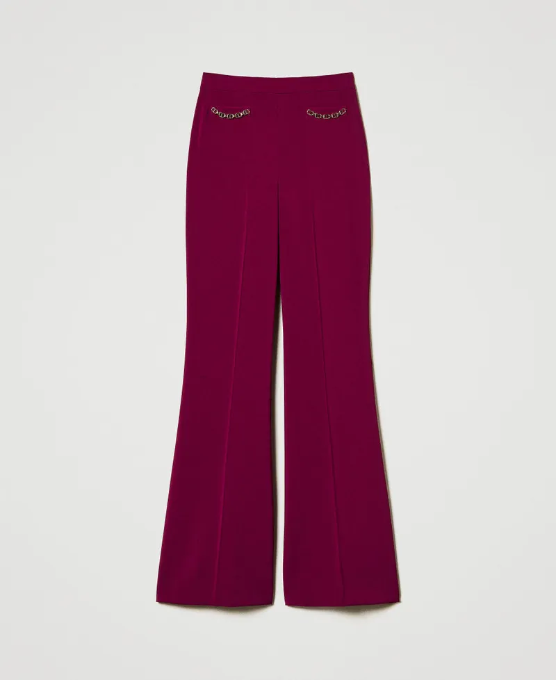 Pantaloni flare con catena Oval T