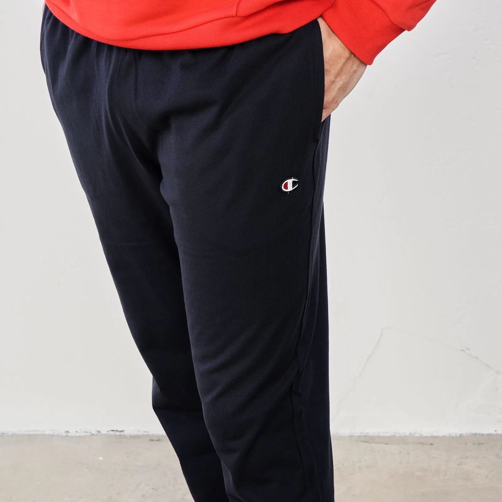 Pantaloni sportivi blu in cotone con tasche e logo