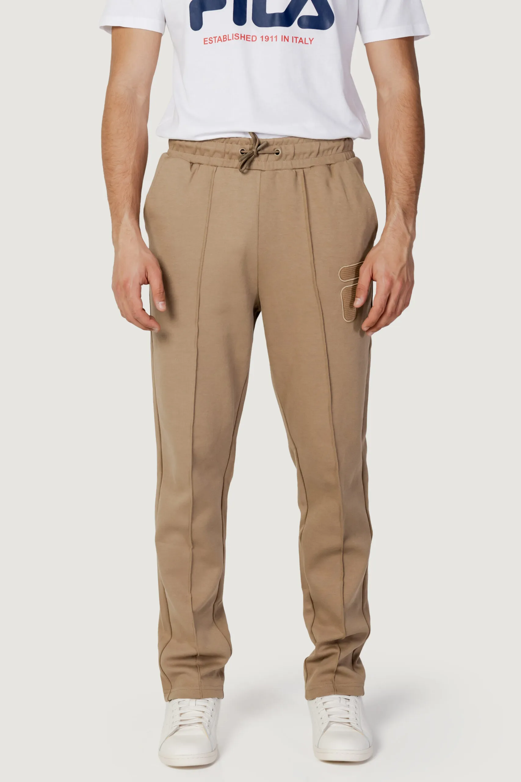 Pantaloni sportivi Fila costa tappered pants Beige scuro